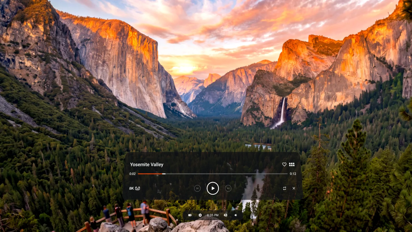 An 8K immersive clip of Yosemite Valley filling the whole view, with playback controls floating over it